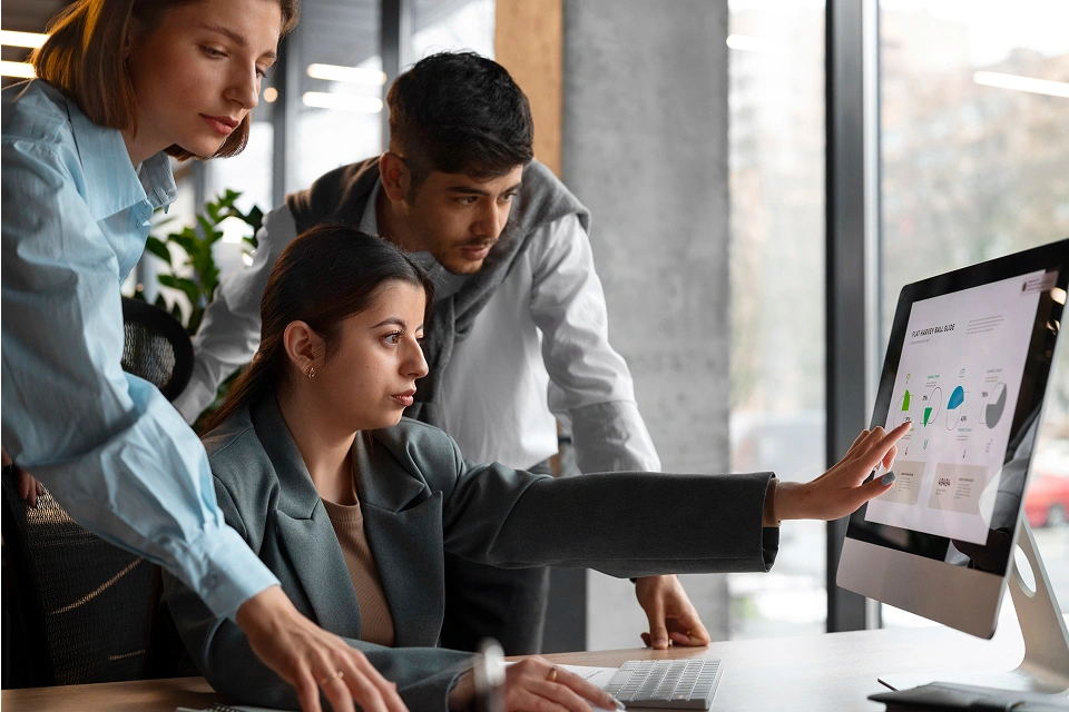 Team collaborating on CRM and SharePoint business workflows