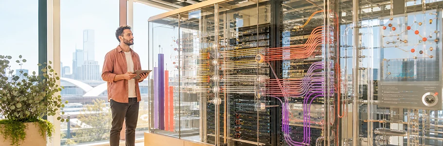 Australian specialist reviewing a modern data platform in a bright technology lab